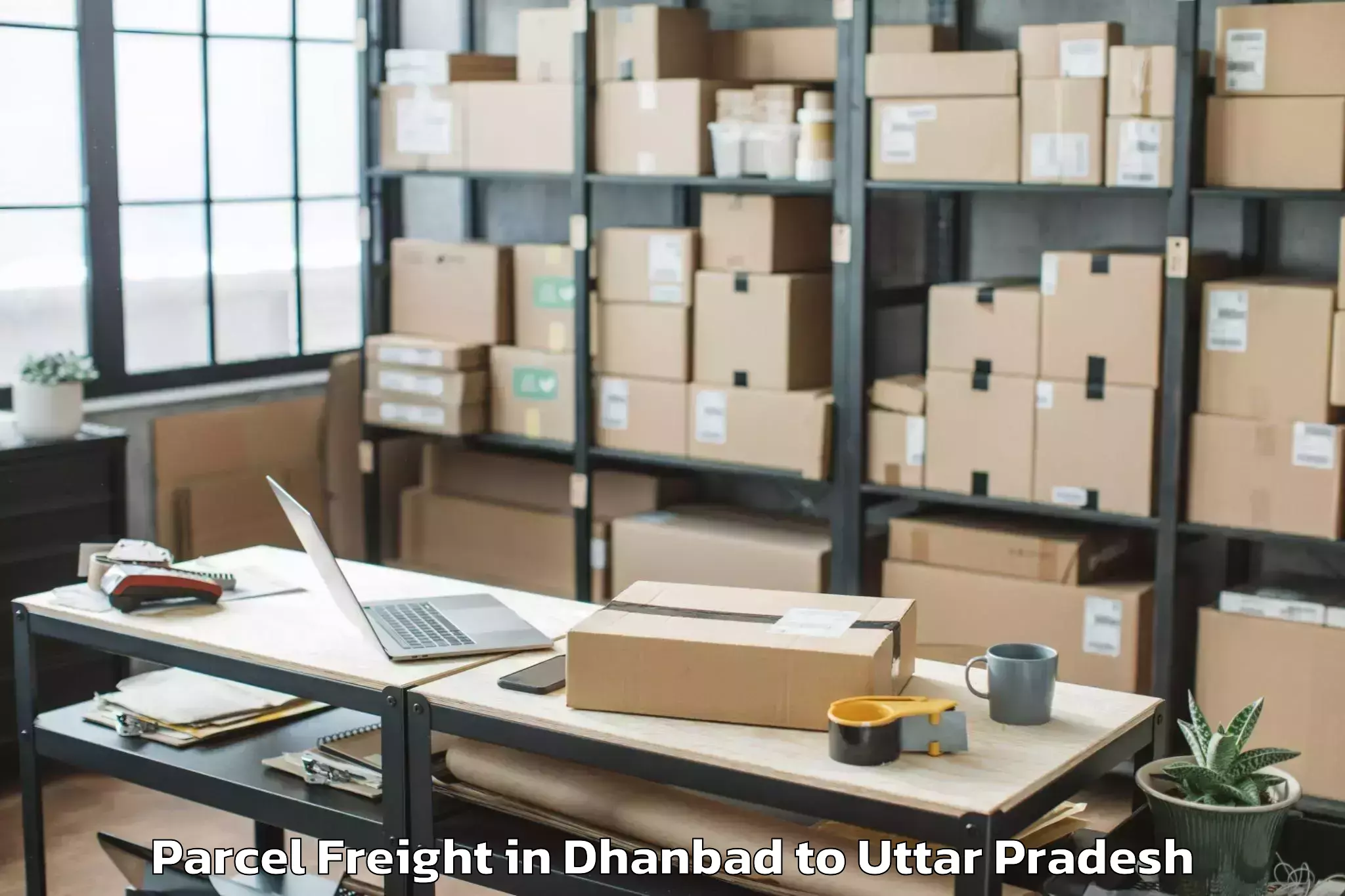 Dhanbad to Bundelkhand University Jhansi Parcel Freight Booking